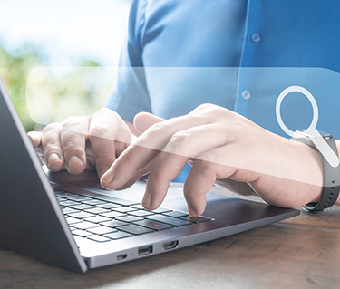 Man searching the web on laptop